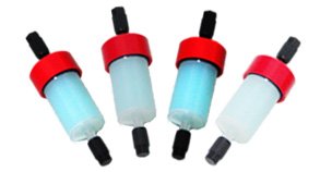 Four small blue cylindrical components with red end caps and black connectors, arranged diagonally.